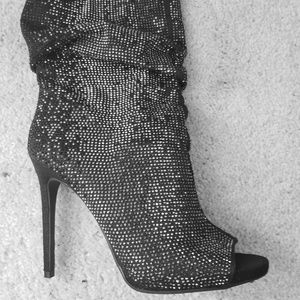 JS Booties. Seem size 7 vs 7.5. Never even wore them. Sad to let them go!